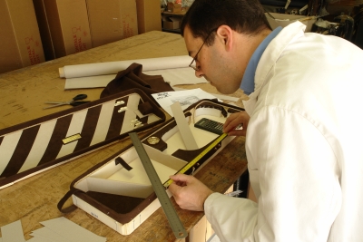 Dimitri Musafia personally creating the distinctive interior of Opus VII. Opus cases are special, individually crafted cases in which Mr. Musafia personally takes part in the construction, not just the design.