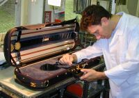 Checking the accessory box lids for perfect closure. Each one is made individually and cannot be installed in another case.